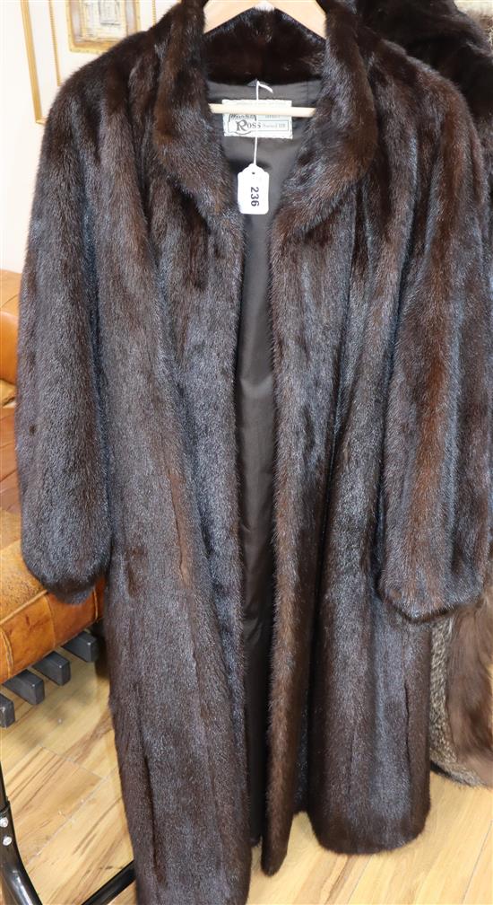 A brown full length mink coat